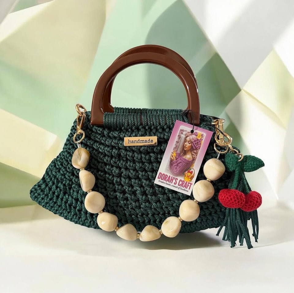 Crocheted cherry charm with tassel